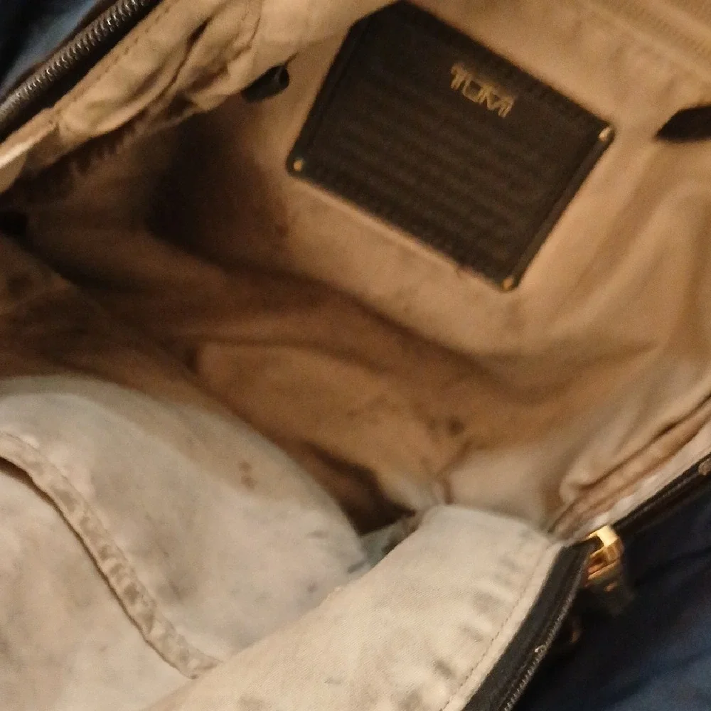 Tumi Black Belt Bag with Gold Accents